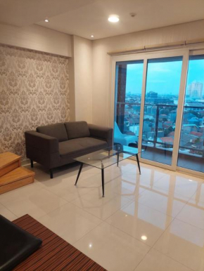 Maqna Residence Apartemen